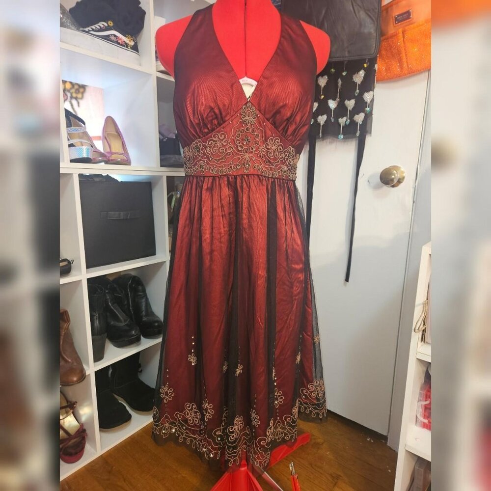 Burgundy and black beaded halter dress.